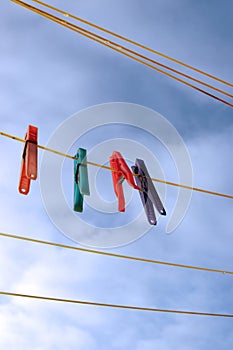 Pegs on a wet washing line