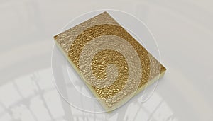 Peice of gold on shiny surface golden book 3d photo