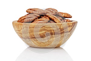 Pekan nuts in wood bowl photo