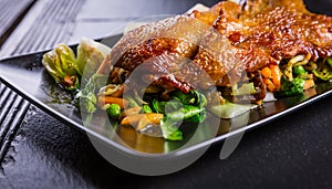 Peking duck breast with pak choi and vegetables