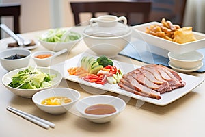 peking duck meal set with side dishes