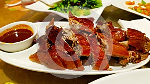 Peking duck with sauce, a typical dish of Chinese cuisine