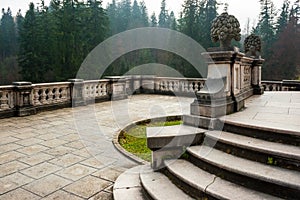 Peles castle ornamental garden balcony, Sinaia, Romania. Landmark of Carpathian mountains in Europe. View from the left