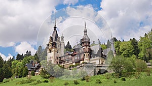 Peles castle in Sinaia, Romania, a popular sightseeing destination for tourism in the Carpathian Mountains. Time lapse.