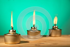 Pelita or oil lamp, traditional Malay oil lamp lit up during Ramadan and Hari Raya Aidilfitri Muslim celebration