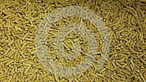 Pellets fuel with spruce sawdust into the delivery strew bio wooden pallets to industrial modern boiler, detail biofuels