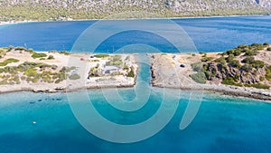 Peloponnese, Greece Aerial view on turqouise blue water and sandy beach. Limni Vouliagmeni or Ireon Lake, photo