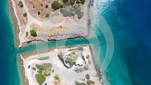 Peloponnese, Greece Aerial view on turqouise blue water and sandy beach. Limni Vouliagmeni or Ireon Lake,