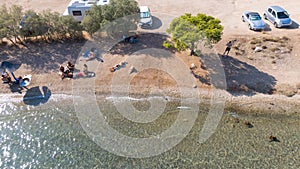 Peloponnese, Greece Aerial view on turqouise blue water and sandy beach. Limni Vouliagmeni or Ireon Lake, photo