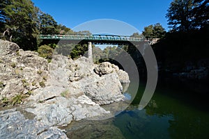 Pelorus Bridge over the River in New Zealand on a sunny day