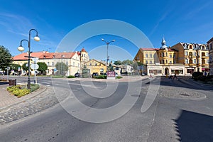 Pelplin, Pomorskie / Poland - September, 18, 2020: Small town center. Old tenement houses at the main intersection