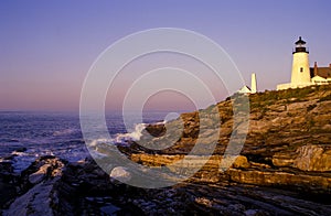 Pemaquid Lighthouse Over Rock Formations In Maine