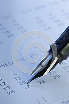 Pen and calendar close-up - Stock Image