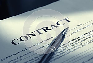 Pen on contract papers