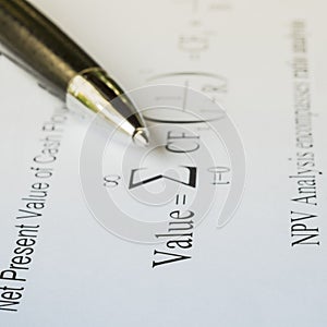 Pen on Discount cash flow model.