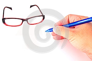 pen, glasses and