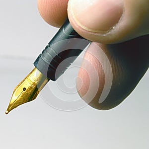 Pen with gold tip