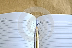 Pen lying on a notebook