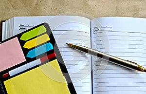 Pen lying on a notebook