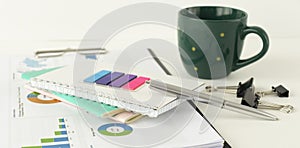 pen on a notebook into a cell