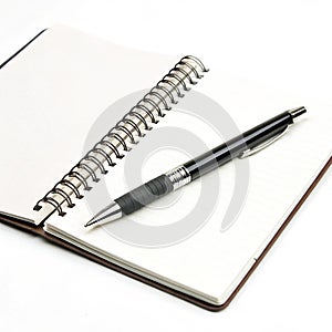 Pen with notebook isolated on white background photo