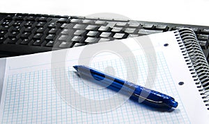 Pen, notepad and keyboard. Idea. Computer keyboard. Notepad. Pen