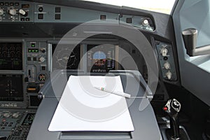 Pen and paper in cockpit