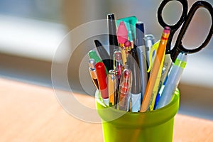 Pen and Pencil Holder on Desk photo