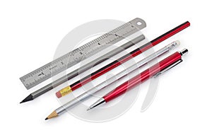 Pen, pencils and measuring ruler in inches