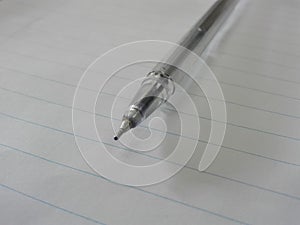 Pen with pure white paper with single rules