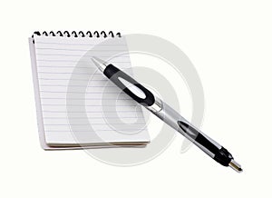 Pen on a spiral notepad