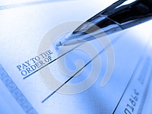 Pen Writing Check for Payment of Dollar Amount Pay to the Order of
