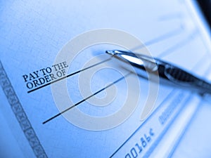 Pen Writing Check for Payment of Dollar Amount Pay to the Order of