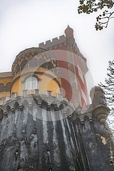 Pena National Palace shrouded with fog, famous landmark, Sintra, Lisbon, Portugal, Europe.