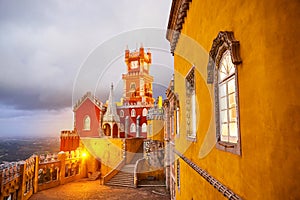 Pena Palace in Sintra, Lisbon, Portugal in the night lights. Famous landmark. Most beautiful castles in Europe photo