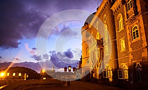 Pena Palace in Sintra, Lisbon, Portugal in the night lights. Famous landmark. Most beautiful castles in Europe