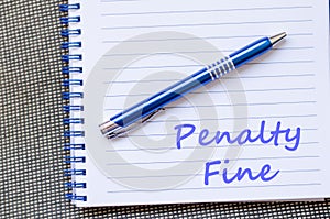 Penalty fine write on notebook