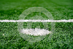 Penalty point on artificial grass football pitch