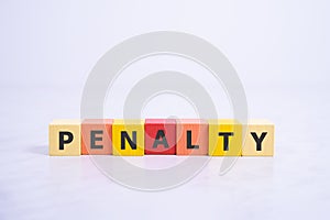 PENALTY word made with building blocks, payment concept