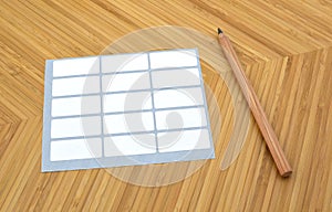 Pencil and adhesive labels