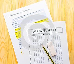 Pencil on answer sheet and question sheet