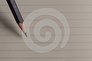 The pencil on blank paper image closeup