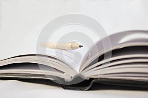 Pencil on a book
