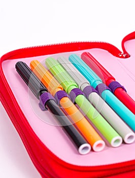 Pencil case with bright colored pens