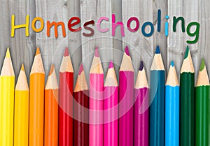 Pencil Crayons with text Homeschooling photo