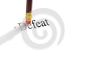 Pencil eraser trying to remove the word `defeat` on paper. Concept.