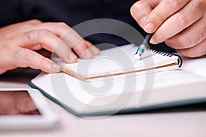 Pencil Erasing on Notebook