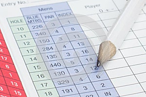 Pencil on a golf scorecard