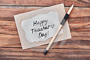 Pencil, happy Teacher`s Day card.