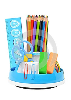 Pencil holder with rule, scissors and erasers